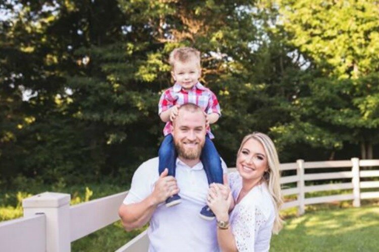 Tucker Barnhart with his wife Sierra and son Tatum. 