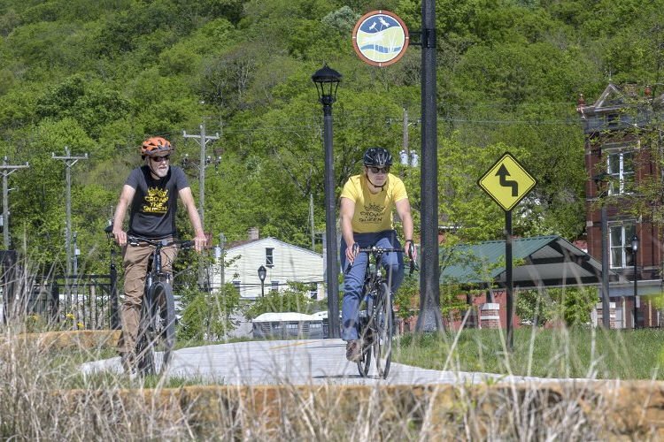 l to r: UC Research Asst. Prof. Geography, Chris Carr and Director of Tri-State Trails, Wade Johnston at Lick Run Greenway, right at the tip of Queen City off the Harrison Ave viaduct.