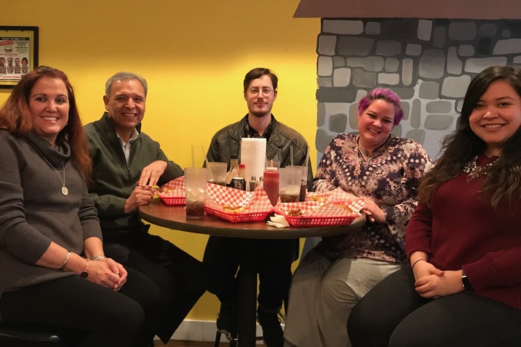 Gathered staff include, from left, Executive Director Irene Encarnacion, Board Chair Leo Calderon, NKU intern Jack Maslovar, Resource Manager Cyndy Rodewald, and NKU intern Brenda Moran.