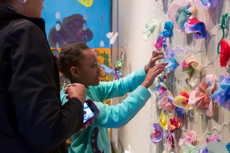 Children in a fiber art workshop.