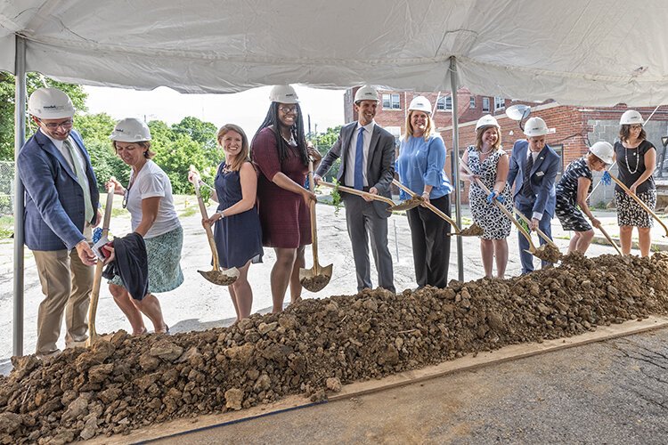 Community leaders at the groundbreaking of the old Manse Hotel.