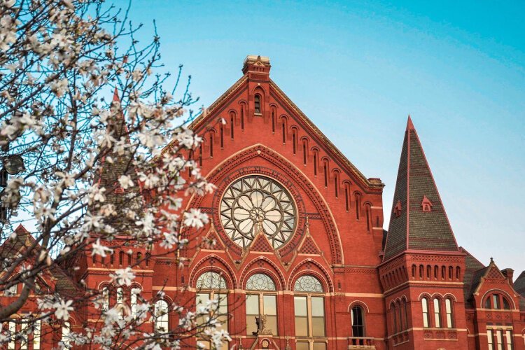 The outdoor tour of Music Hall allows visitors hear iconic stories and see the intricate details of the historic building.