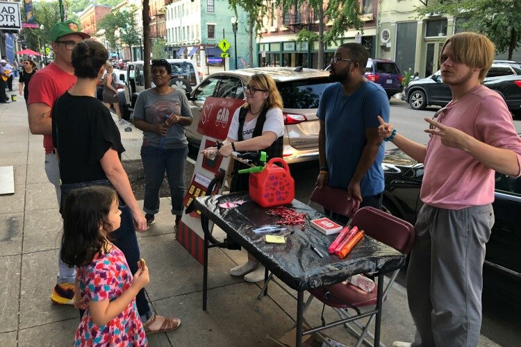 The Cincinnati Artist Report team engages with artists outside the 1305 Gallery in OTR during Final Friday.