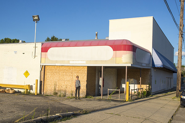 Resident Mary Jo Minerich outside the future Apple Street Market.