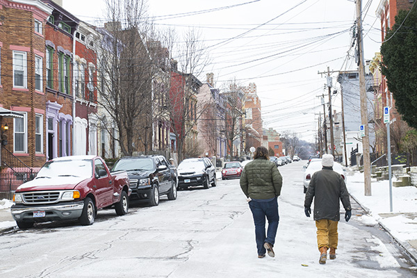 Casey Coston (right) and Joe Creighton on Dayton Street, where Creighton is rehabbing a house