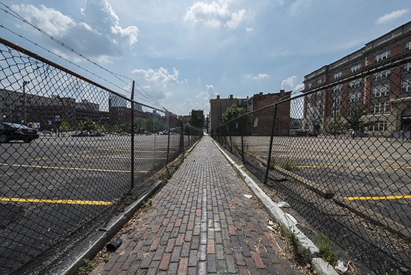 This unrelenting heat sink of parking lots and stormwater runoff is surrounded by development buzz 