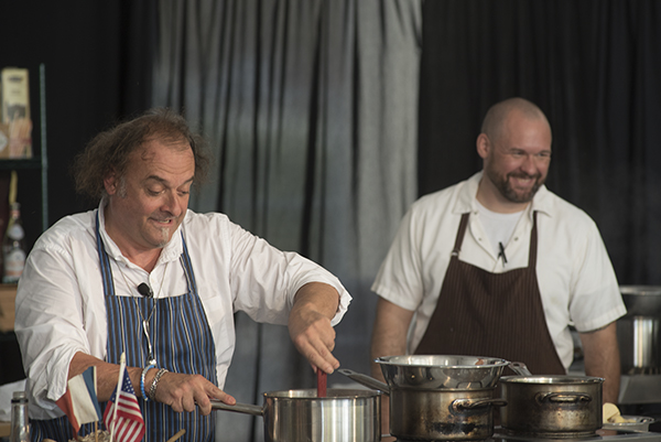 Chef Jean Robert de Cavel giving a cooking demo at the Cincinnati Food + Wine Classic.