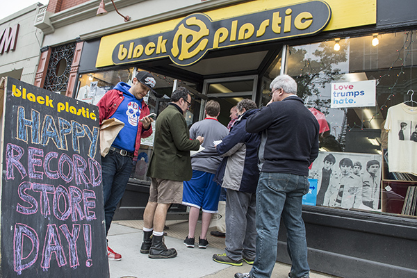 Aging hipster contingent awaits entry to Black Plastic Record Store.
