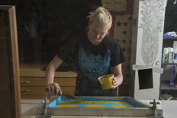 Lauren Mancini working on print-making