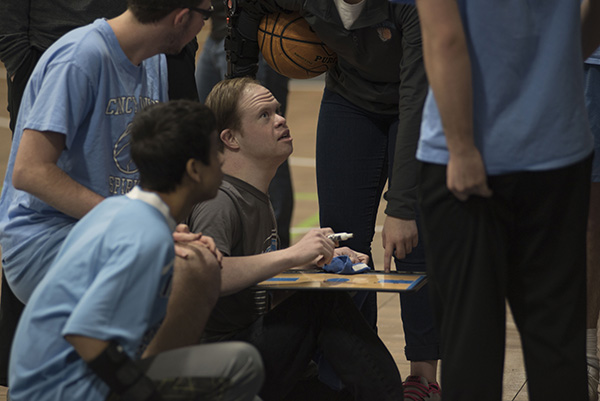 Mike Holmes coaches the Cincy Swish, a premier youth basketball team.