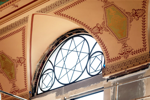 Historical renovators have recreated Victorian window "tracery" from Hannaford's original design plans.