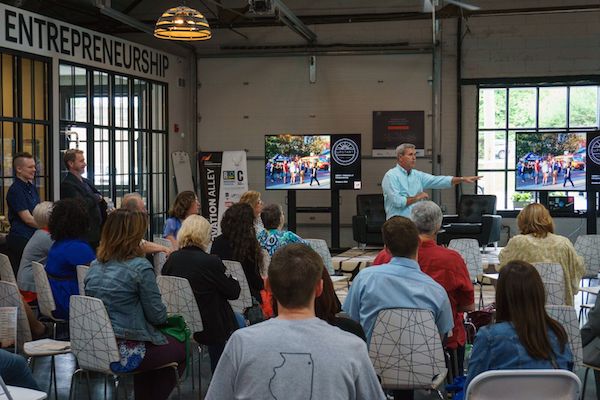 NKY Innovation Network's Casey Barach leads a conversation at the group's Innovation Alley headquarters.