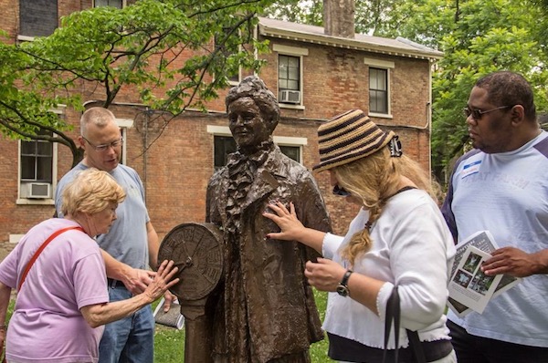 Visually impaired residents take part in a nano-grant funded art walk.