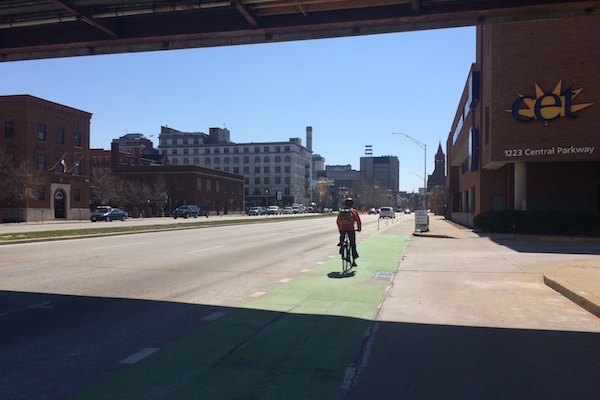 Protected bike lanes on Central Parkway still must contend with heavy car traffic in some areas.