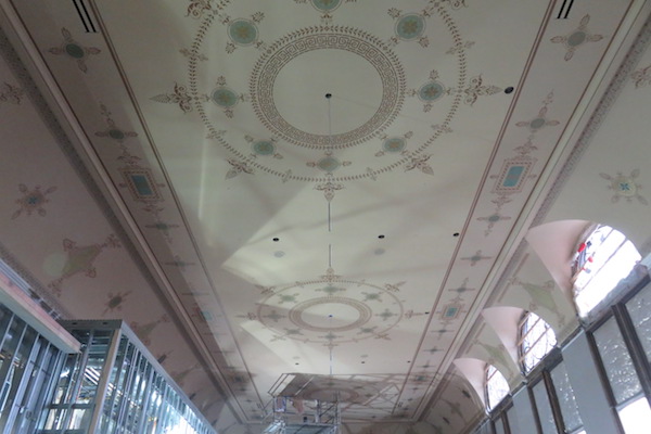 Restored original ceilings enhance the theater's dramatic decor.