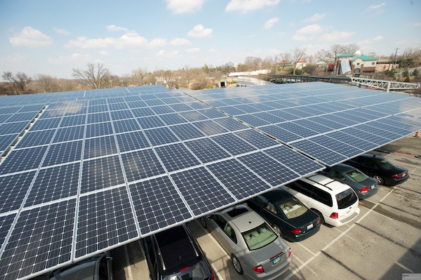 Solar panels provide shade for cars at the zoo's Vine Street parking lot and energy for overall zoo operations.