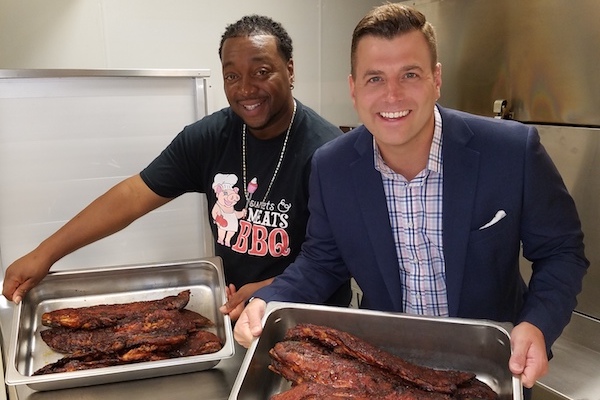 Anton Gaffney, Sweets & Meats BBQ pitmaster, shows off his ribs.