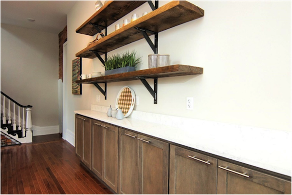 Salvaged beams were used for shelving in both townhomes.