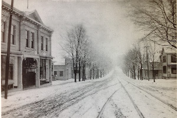 Historic photo of Mt. Healthy's central business district, with The Main Theater on the left.