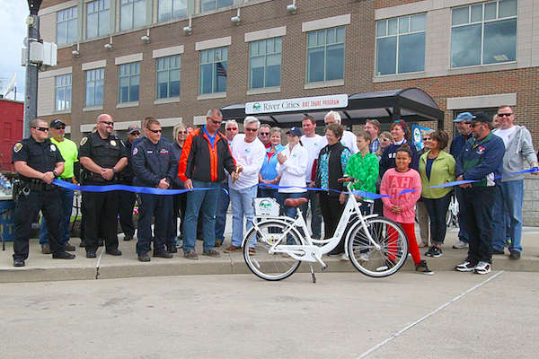 Ribbon cutting for the bike share program in downtown Lawrenceburg.