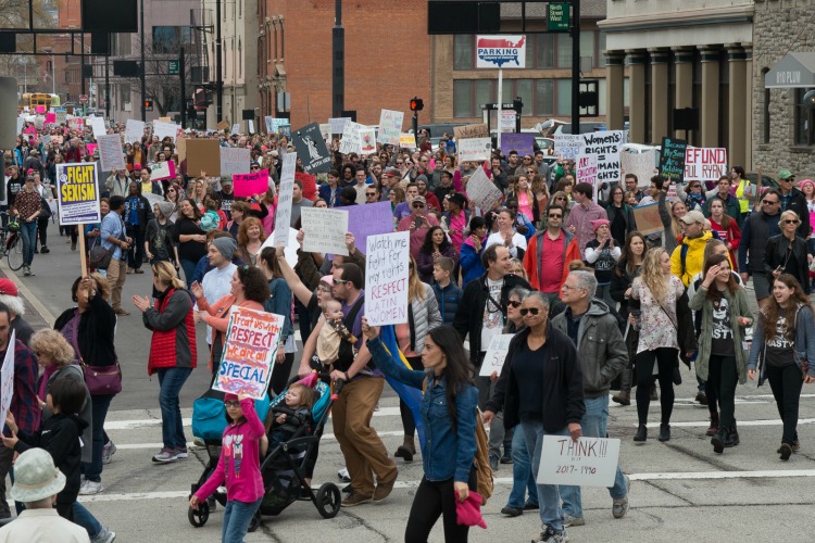 Marchers wore pink hats, #nastywomen shirts, and carried handmade signs the day after the 2017 inauguration.