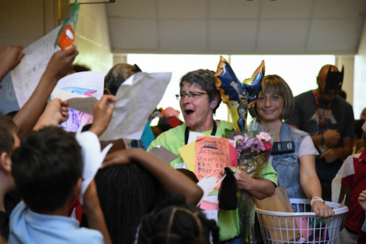 Students and staff gather to say goodbye to assistant principal Chris Collier, who retired after four years at PRM.