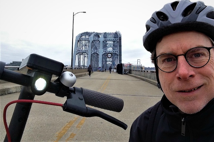 Author David Holthaus says that the Bird scooter was a quick, fun way to travel across the Purple People Bridge.