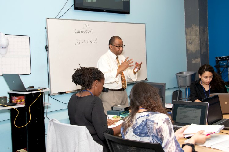 Delrae McNeill, Manager Technical Instruction, leads spring CompTIA A+ class.