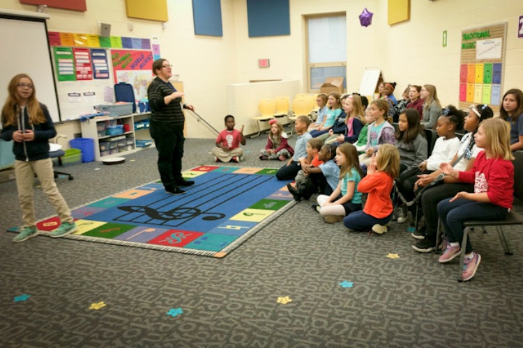 Music instructor Maria Kitsinis teaches a 6-9 class.