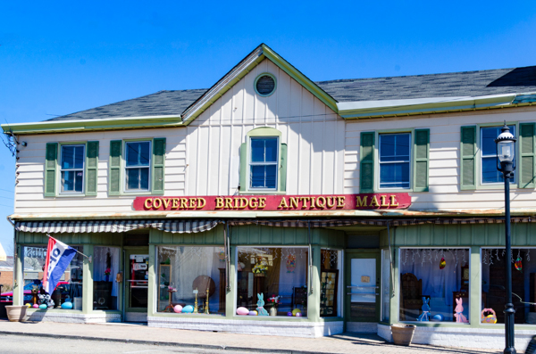 Covered Bridge Antique Mall is a destination and a shopping adventure, but old-timers here still call it Holzhausers Department Store, and local legend says the building started as a log cabin.