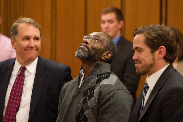 Mark Godsey, left, with exoneree Rickey Jackson, center, whose story will be featured in the opera Blind Injustice.