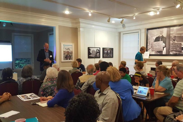 Clete Benken of MSKS listens to KH residents discuss affordable senior housing.