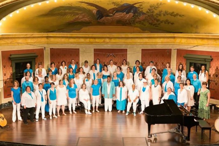 The choir takes the stage at Memorial Hall.