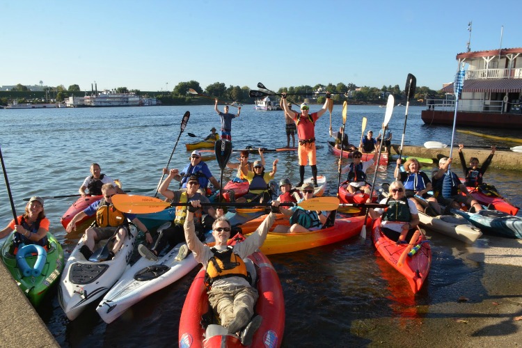 Safety kayakers line the course to assist swimmers if necessary.