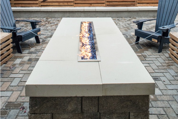 A fire pit allows the patio to stay open in cooler weather.