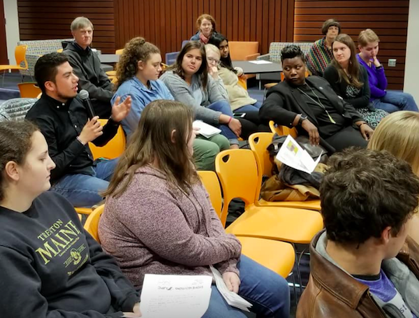 Audience members at Xavier University ask questions about the death penalty after viewing The Penalty.