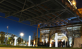 A glamorous 2016 opening weekend reception on the waterfront, underneath the Roebling Bridge.