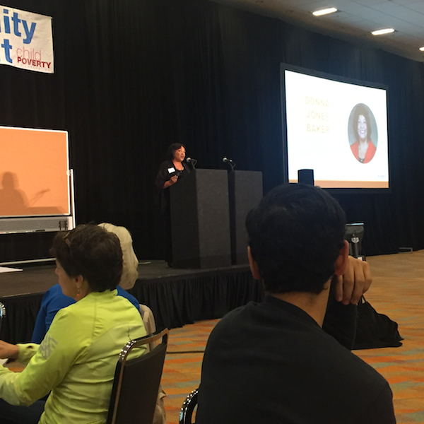 Donna Jones Baker, president of the Urban League, addresses the Childhood Poverty Summit.