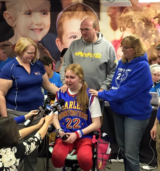 Lauren Hill (center) has been a tireless fundraiser for the fight against DIPG