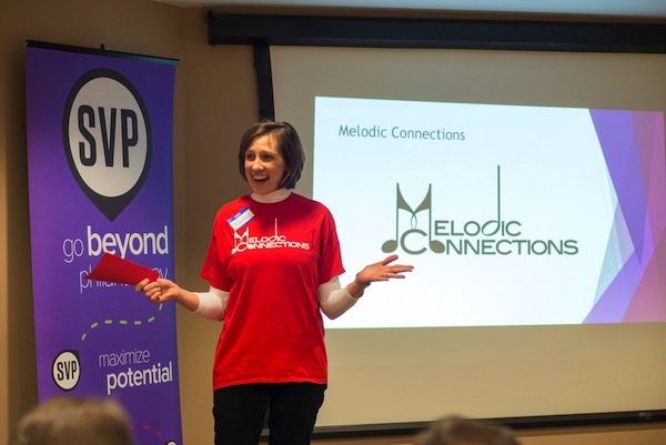 Betsey Zenk Nuseibeh of Melodic Connections gets ready for Fast Pitch 2015