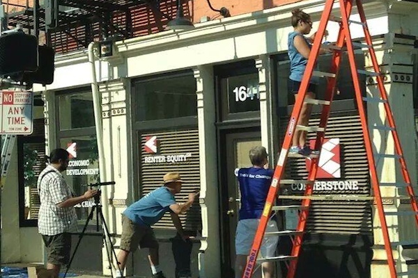 Volunteers and residents do upkeep on Cornerstone property