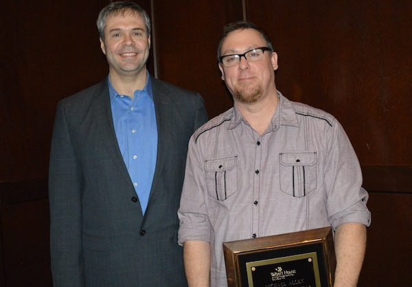 Michael Allen (right) accepts Employee of the Year from Talbert V.P. Brad McMonigle