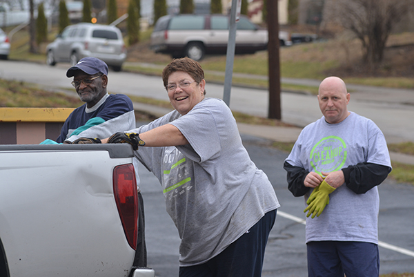 Patti Hogan cleans up with Bob Greenlee (left) and John Ridder