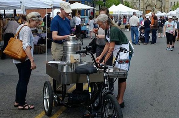 Harriet Matthey serves from the SoupCycle