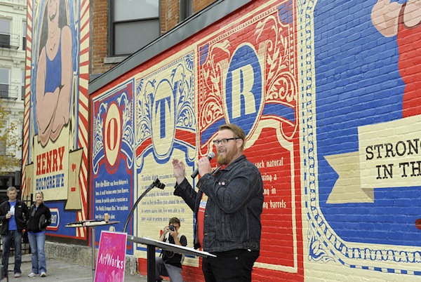 Snell designed the "Strongman" mural in Over-the-Rhine