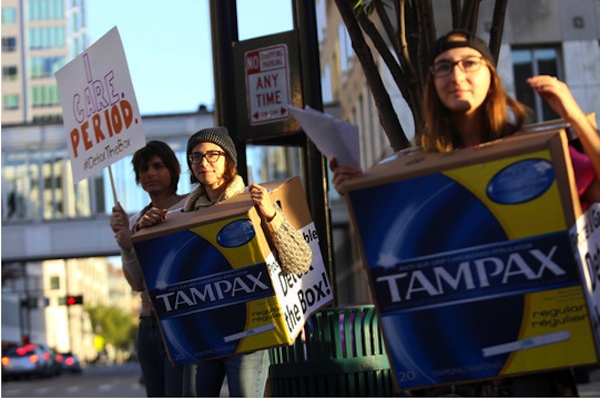 Protestors outside the P&G shareholder meeting, where the company announced plans to use wind power at its factories