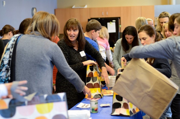 Jewish Federation volunteers recently assembled Thanksgiving meals for those in need, one of many community programs funded throughout the year