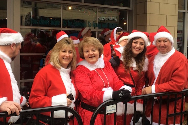 Santacon bar-hops around town on Dec. 12