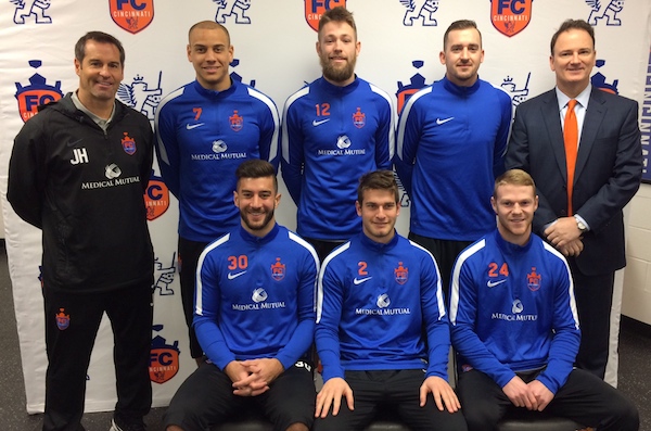 FC Cincinnati President Jeff Berding (standing right) and Coach John Harkes welcome the team's six newest player signings Feb. 15