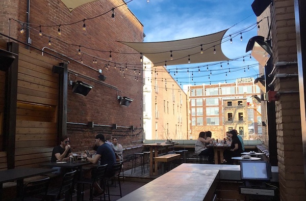Krueger's Tavern serves food and drinks on its rooftop patio